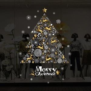Christmas tree window decals featuring gold reindeer and white snowflakes for glass doors