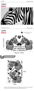 Macro view of black and white zebra wall decal featuring a heart and motivational text