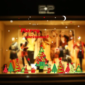 Detailed Christmas tree window clings set with Merry Christmas text on store display
