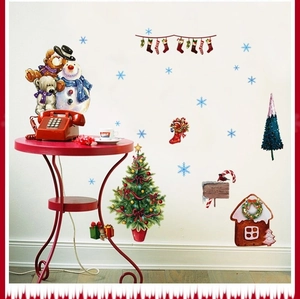 Detailed Christmas wall stickers featuring snowmen, bears, and gingerbread house in home setting