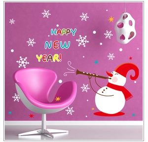 Christmas snowman wall sticker with Happy New Year lettering and snowflakes on purple wall