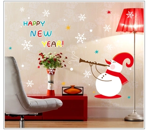 Christmas snowman and Happy New Year wall decals applied on a living room wall