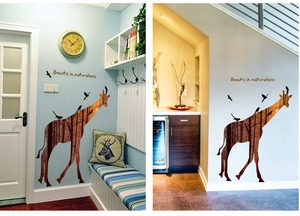 Detail of giraffe wall decal with nature forest silhouette and beauty text for home decor