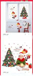 Detail view of removable Christmas wall stickers with tree and snowflake patterns