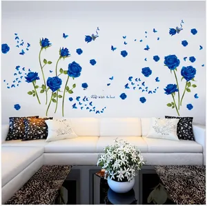 Blue Enchantress rose and butterfly wall stickers applied on white living room wall