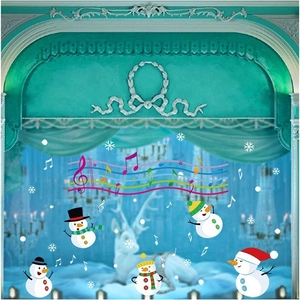 Christmas window stickers featuring cartoon snowmen, musical notes, and white snowflakes