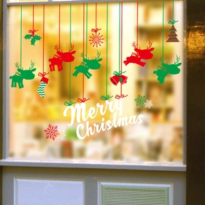 Christmas window stickers with reindeer and snowflakes for festive glass decoration