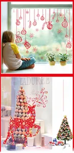 Detail of red reindeer silhouettes and Christmas window stickers for festive decoration