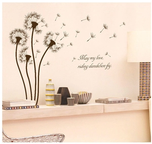 Detailed view of dandelion wall sticker and romantic quotes on a modern living room wall