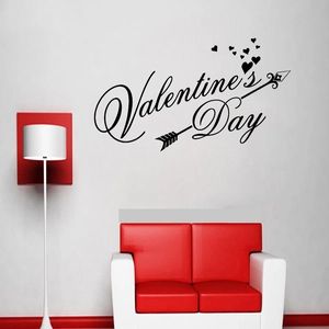 Valentine's Day LOVE wall sticker with hearts and arrows on a white interior wall