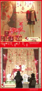 Detailed Christmas window stickers with red reindeer and festive hanging decorations