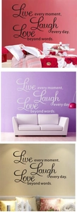 Detail showing Live Every Moment, Laugh Every Day, Love Beyond Words wall decal on home walls