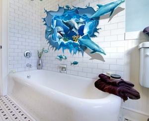Detailed view of 3D dolphin wall stickers showing realistic aquatic life on white tile