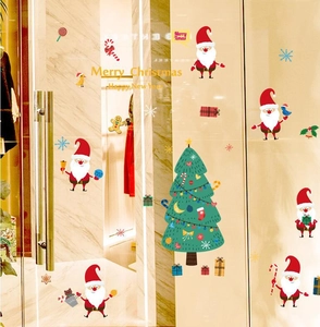 Christmas window decals with Santa Claus and festive trees for holiday glass decoration