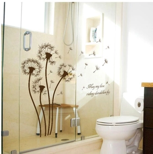 Dandelion wall sticker with flying seeds and romantic typography on shower glass