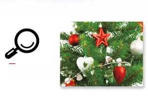 Detailed view of assorted Christmas ornaments with matte and glitter finishes