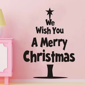 Christmas tree wall sticker with holiday greetings on a cozy pink interior wall