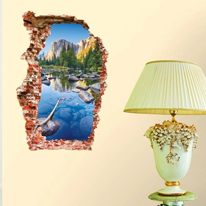 3D broken brick wall sticker featuring a realistic mountain and forest landscape