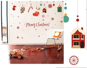 Christmas window decals with Merry Christmas text snowflakes and festive gift box patterns