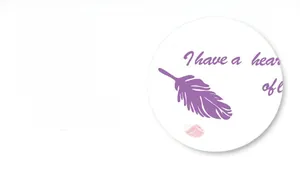 Detail showing white fabric texture with soft purple feather patterns and elegant typography