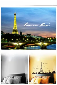Detailed view of the Eiffel Tower wall decal with clouds, birds, and vintage typography