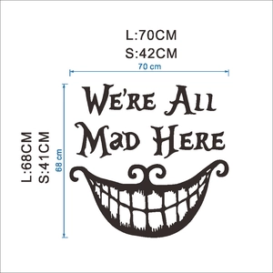 Black Cheshire Cat wall decal showing dimensions and We're All Mad Here text quote
