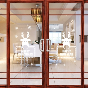 White Christmas window decals featuring deer and snowflakes for glass door decoration