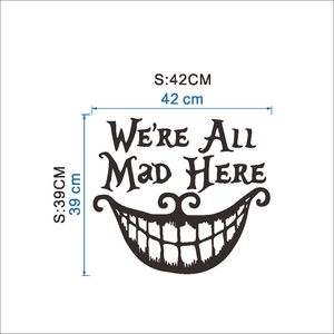 Detail showing dimensions of 42x39cm for the We're All Mad Here cat smile wall decal