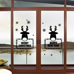 Christmas reindeer and snowflake window decals for holiday glass decoration