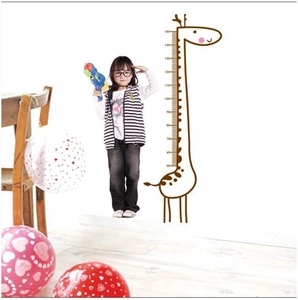 Cartoon giraffe height chart wall decal for kids measuring 50cm to 150cm on bedroom wall