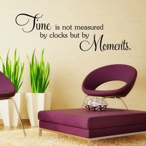 Inspirational English wall sticker Time is not measured by clocks but by Moments