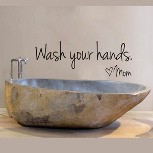Detail of Wash your hands Mom wall decal sticker in a bathroom setting with stone sink