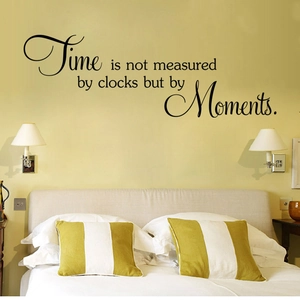 Creative black PVC wall decal with artistic English quote Time is measured by Moments