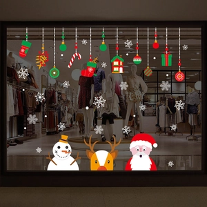 Christmas wall stickers with Santa, snowman and reindeer on glass window display
