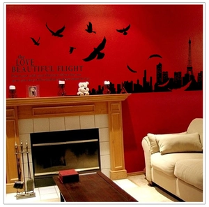 Macro detail of Paris skyline wall decal with Eiffel Tower and bird silhouette on wall