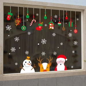 Christmas window stickers featuring Santa Claus, reindeer, and snowmen for home decoration