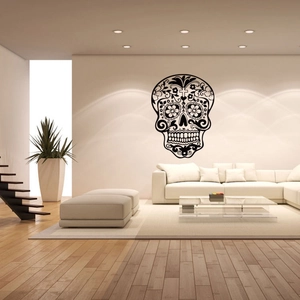 Detailed Mexican sugar skull wall decal with floral patterns in a modern living room