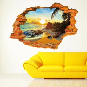 3D beach sunset wall sticker with broken brick effect over a yellow sofa decor