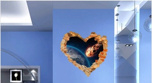 Detail view of 3D cracked wall heart sticker featuring earth and a burning meteor