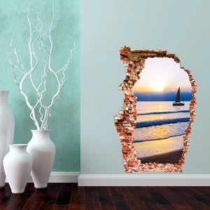 3D wall sticker detail showing sunset beach landscape through a realistic broken brick wall