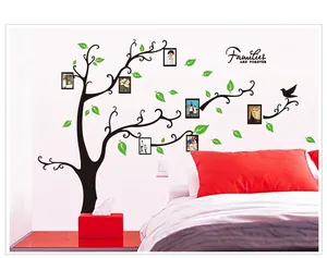 Sticker mural arbre généalogique avec tronc noir et feuilles vertes pour salon