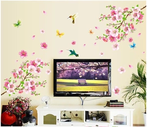 Pink cherry blossom wall decal with colorful butterflies and hummingbirds for home decor
