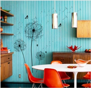 Black dandelion silhouette wall stickers with butterflies on a blue striped wall