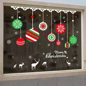 Christmas window decals with red and green hanging ornaments and reindeer stickers
