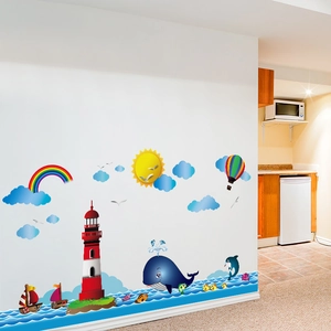Cartoon ocean wall decal with red lighthouse, blue whale, rainbow and sailboat decor