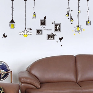 Removable PVC wall decal featuring black pendant lamps, photo frames and Our Memory text