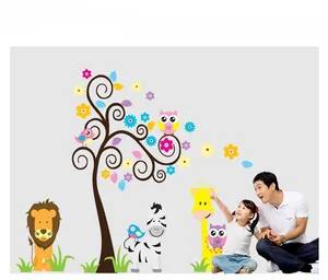 Detailed view of cute cartoon animal wall decals featuring a tree with a lion and giraffe