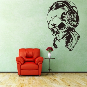 Skull with headphones vinyl wall sticker in modern room with a red sofa background