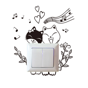 Détail de stickers muraux chat pour interrupteur double avec motifs musique et cœurs