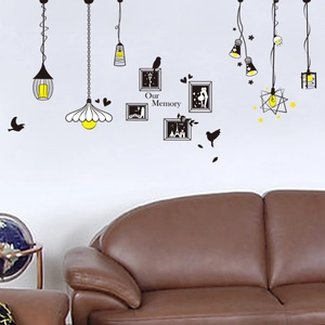 Creative PVC wall sticker with black chandeliers, photo frames, and birds for home decor